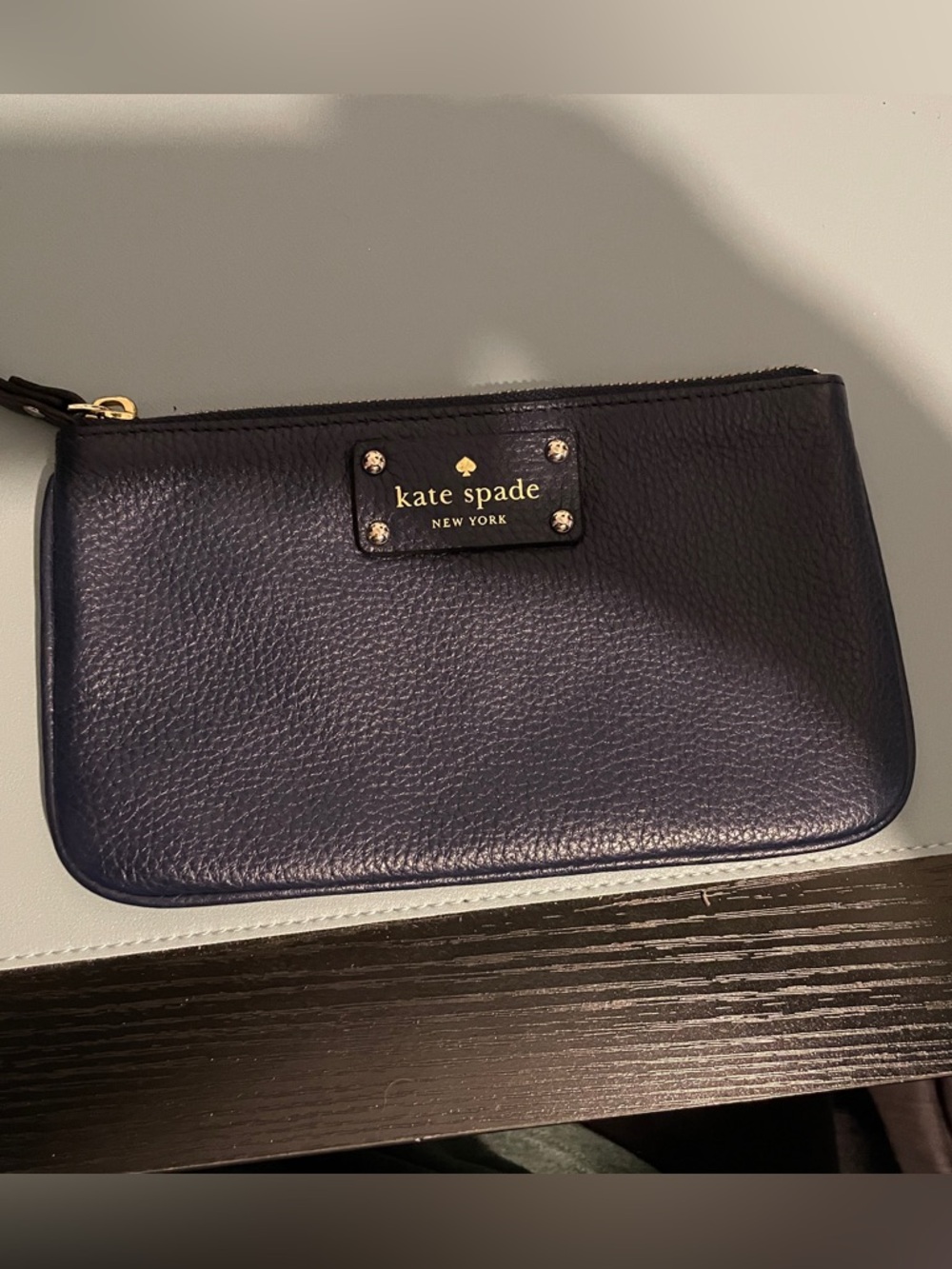 kate spade navy leather wristlet with gold hardware